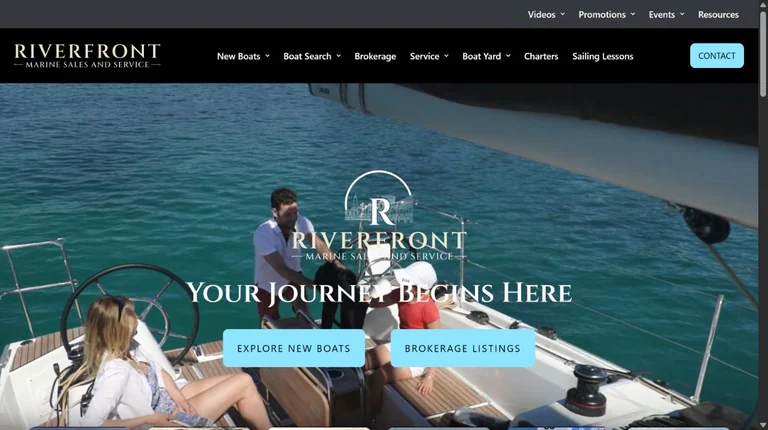 Riverfront Marine homepage with its sailing hero, logo, navigation, and boat search links